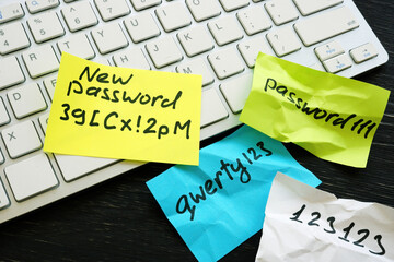 New strong password and weak ones near keyboard. - obrazy, fototapety, plakaty