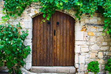 Stone Built Home with a Wooden Rustic Door