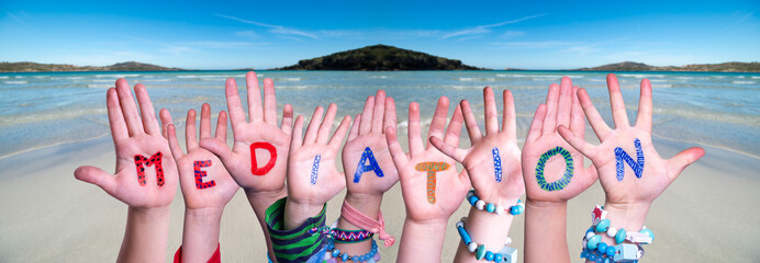 Children Hands Building Colorful English Word Mediation. Ocean And Beach As Background