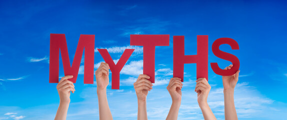People Hands Holding Colorful English Word Myths. Blue Sky As Background