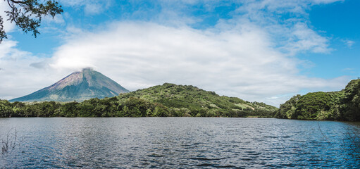 Lush greenery around Chaco Verde lake under the shadow of Volcán Maderas on Ometepe Island in Nicaragua