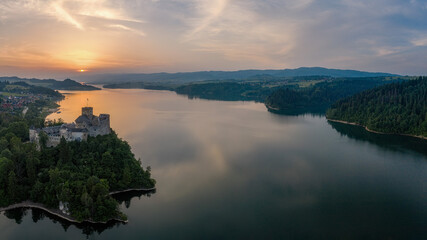 Fototapeta premium Niedzica Castle on a huge cliff above the river valley