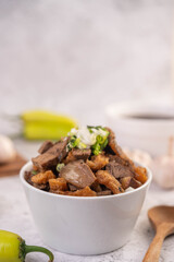  Kuay Jab  in a cup with pork Meatball and Pork Cracker.
