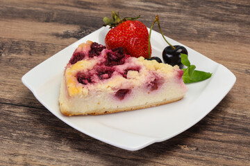 Cheesecake with cherry served strawberry