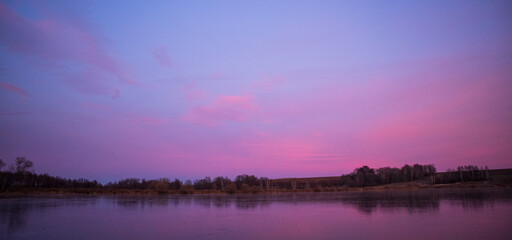 Fototapeta premium sunset over the river