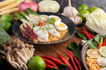 Tom Yum Mama with Squid and Boiled Egg.