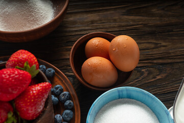 recipe and making american pie with strawberries and blueberries. top view