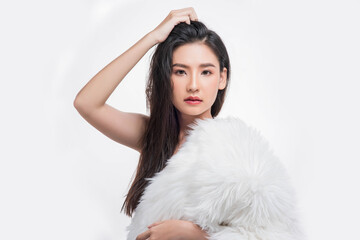 A beautiful, beautiful woman catches her messy hair.