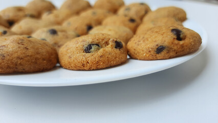 Homemade chocolate chip cookies. Isolated in white background.