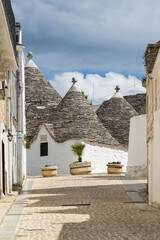 Fototapeta na wymiar La ville d'Alberobello en Italie et ses Trullos fabriqués en pierre