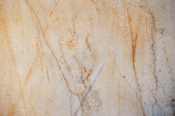 Warm natural marble texture with scratches. Backdrop to use for design or art work.