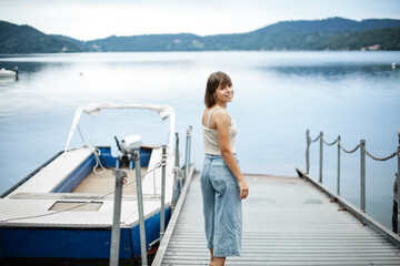 Fototapeta premium Youn woman with her boat