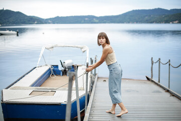 Youn woman with her boat