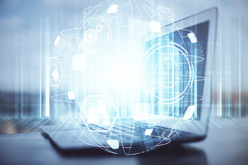 Computer on desktop with social network hologram. Double exposure. Concept of international people connections.