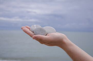 hand with stones