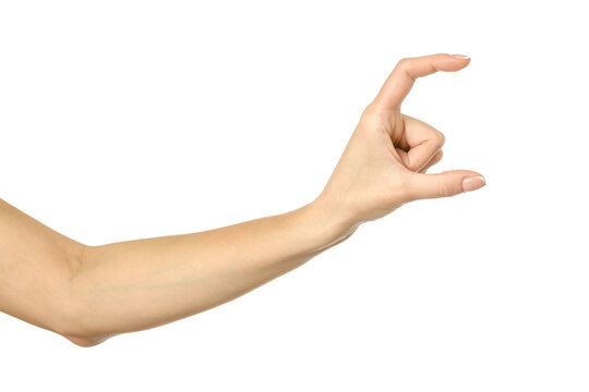 Measuring invisible item. Woman hand gesturing isolated on white