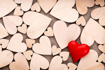 Obraz premium Red heart, valentine day greeting card. Wooden hearts background.