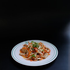 Pork Sausage stick and salted egg yolk spicy vietnamese sausage salad . ( Yum Moo Yor ) Hot Spicy menu recommended to be missed in Thailand