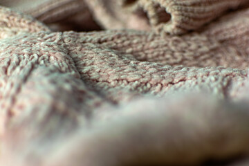 Fototapeta premium Fine textured and voluminous fabric in pink. Embossed textile pattern, pleasant to the touch and delicate, velvety and textured background for design and decoration