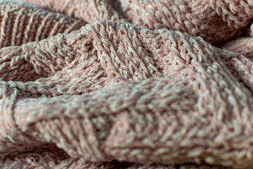 Fine textured and voluminous fabric in pink. Embossed textile pattern, pleasant to the touch and delicate, velvety and textured background for design and decoration