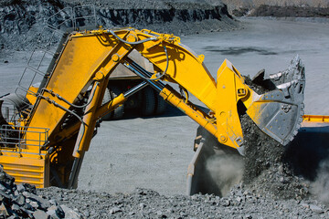 The excavator works at the gold mining site. © CjVitoS