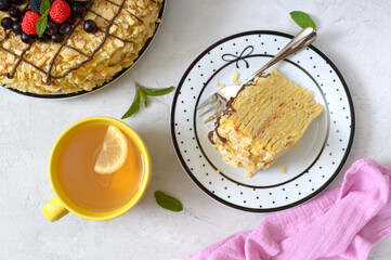 Classic Napoleon cake. Delicious festive layered dessert with puff pastry and custard decorated...