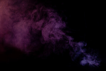 White smoke on a black background. Colored smoke with a blue and red tinge. The texture of scattered smoke. Blank for design. Layout for collages.