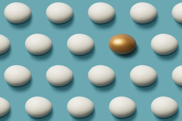 Concept of individuality, exclusivity, better choice. One golden egg among white eggs. Top view.