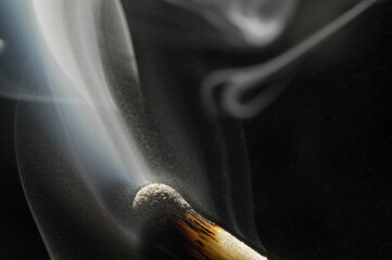 Smoke on a burnt match. Close-up. Macro photography.