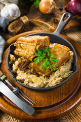 Traditional spare ribs baked in sauerkraut.