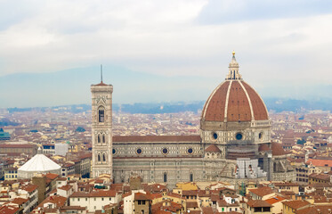 Firenze 2016, aerial view of the red roofs of the city and of the brunelleschi's dome of Santa Maria del Fiore church from the Arnolfo's tower
