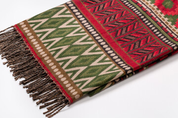 Tippet, shawl, scarf with Native American ornament and fringe.
