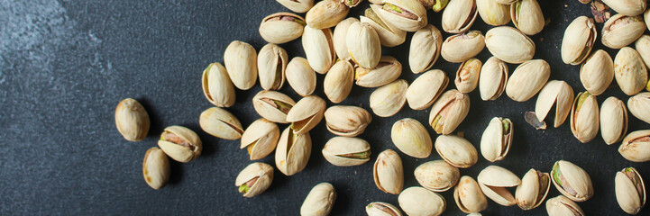 pistachios tasty nuts snack Menu concept serving size. food background top view copy space for text organic healthy eating keto or paleo diet