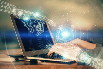 A man working on Laptop with technology theme drawing. Concept of big data. Double exposure.