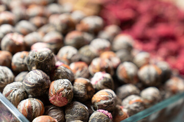 green tea leaves on black background