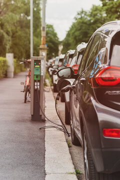 Electric Cars  Charging In A Parking Lot