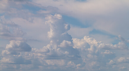 Sky blue On a clear day the air is cloudy and the clouds are beautiful and the clouds have a strange shape. The image is partially clear.