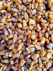 Raisin as a background, dried grape texture. topview