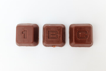 Small chocolate on white background