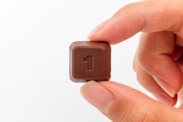 Small chocolate on white background