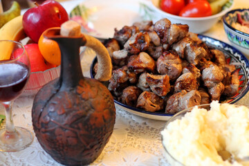 The skewers of meat. Festive table. Background for design