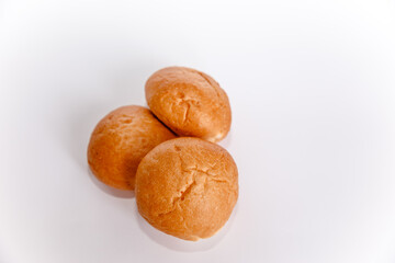 Heap of buns with sesame isolated on the white background