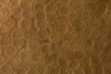 Texture of old forged bronze top view as background