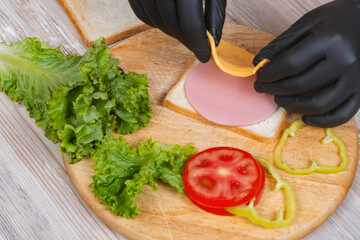 Process of cooking sandwich. variety of fillings and ingredients.Homemade Fast Food concept