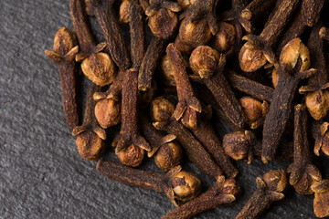 Clove spice as background texture closeup. Macro