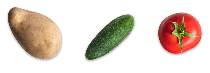Potatoes, tomatoes, cucumbers on an isolated white background. The view from the top