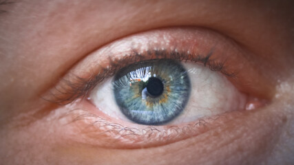 close up of a female blue eye