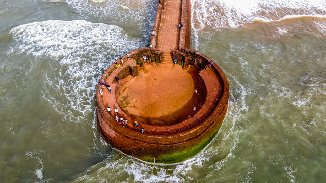 Aerial Drone Shot of Lower Aguada Fort on Sinquerim / Candolim Beach, Goa India