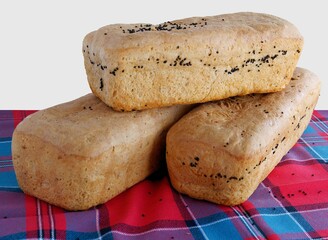 loaf and slices of homemade tasty bread