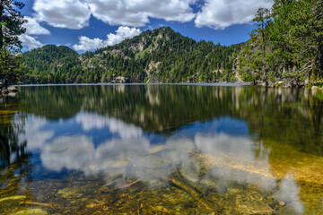 Beautiful reflections of a mountain on the beautiful lake.